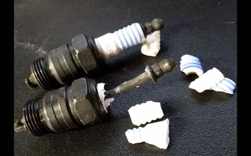 Two broken spark plugs